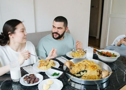 A family sharing a meal at home, highlighting connection and togetherness.